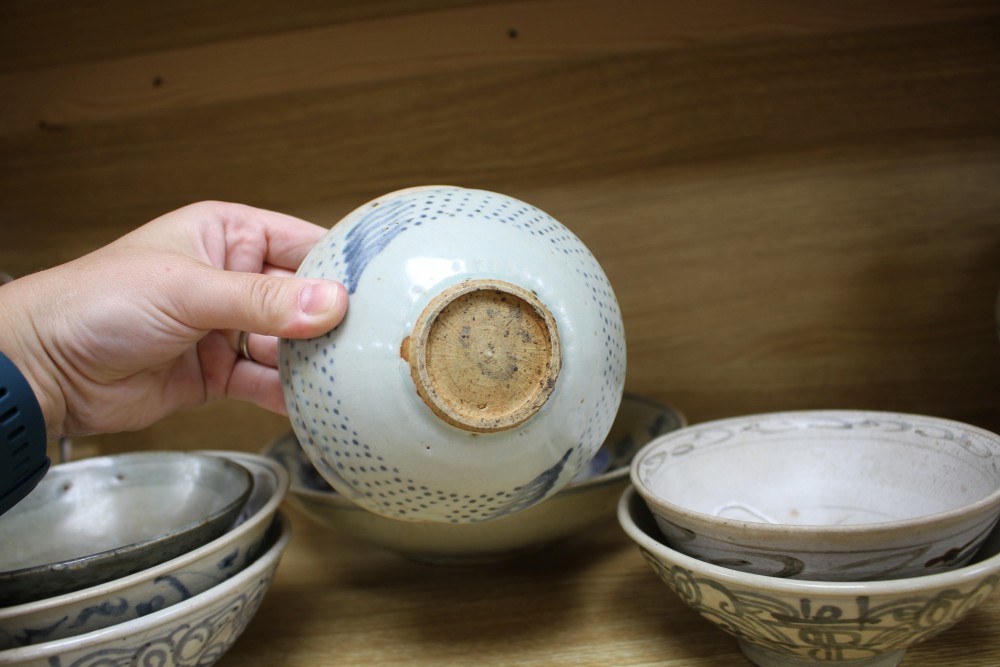 A group of Chinese and Sawankhalok blue and white ceramic bowls and dishes (10)